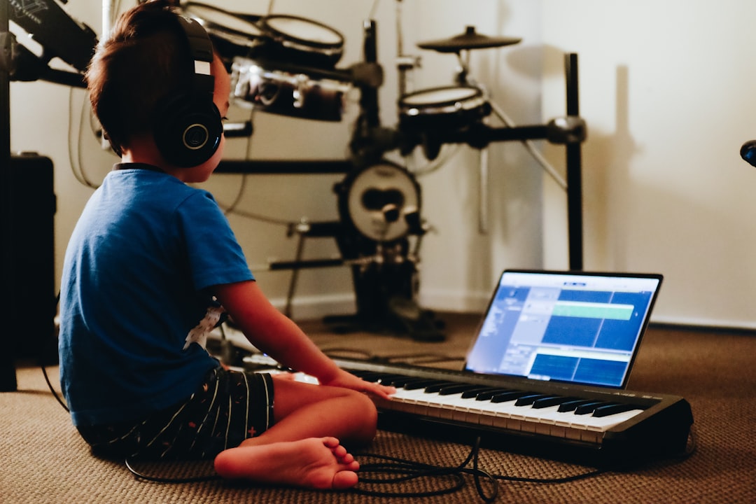 Child playing piano with brain development visualization overlay